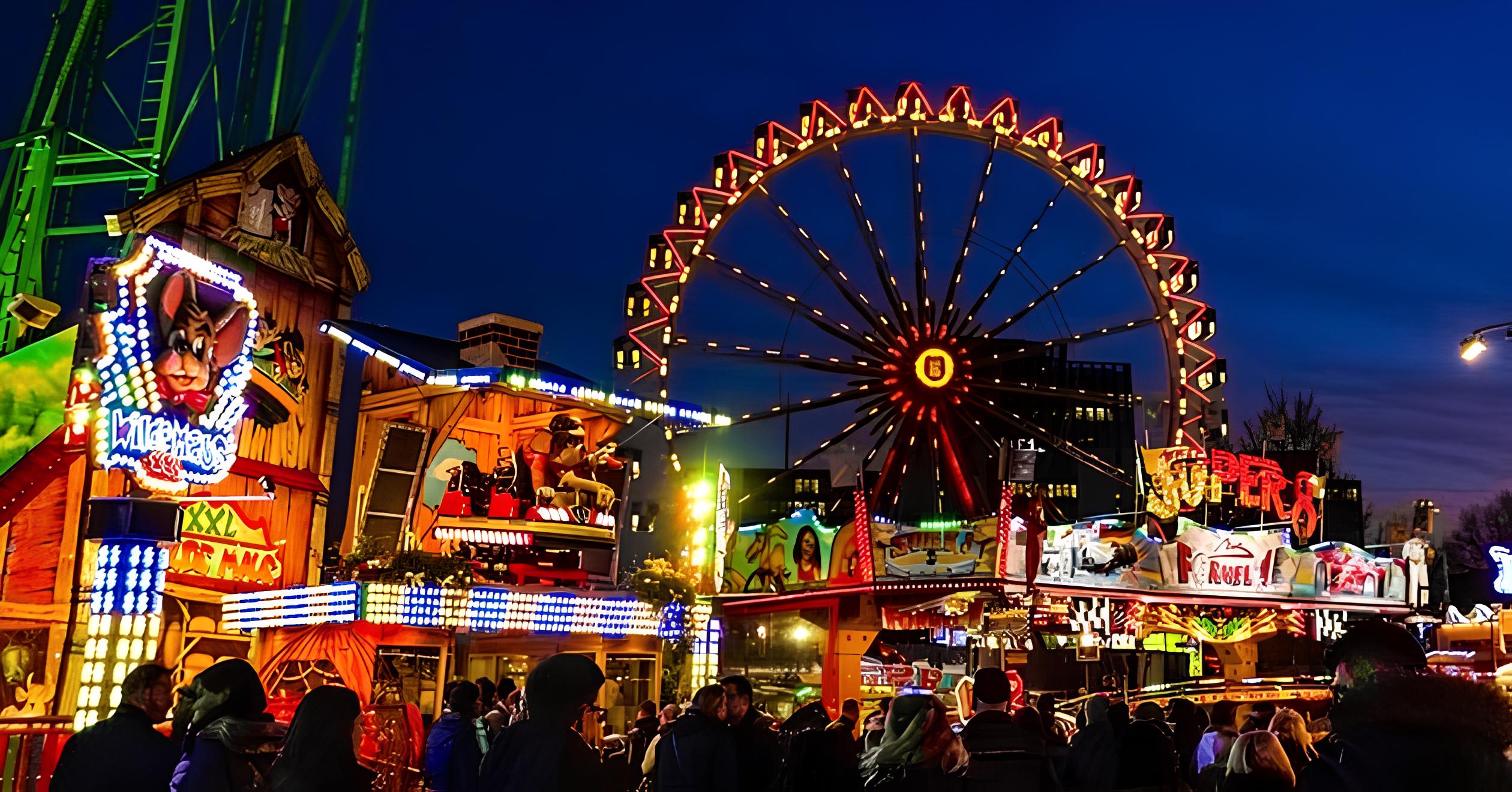 Fête foraine illuminée en soirée